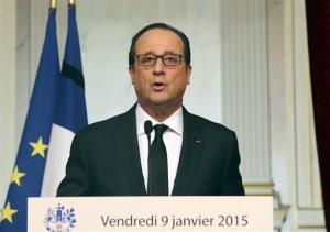 French President Francois Hollande addresses the nation at the Elysee Palace in Paris, France, Friday, Jan. 9, 2015.